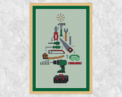 DIY and Construction Workers Christmas Tree cross stitch pattern. Shown in frame.